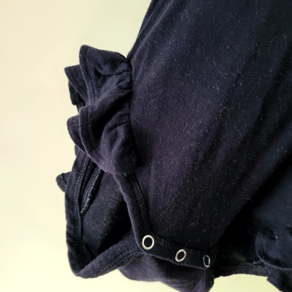 Kate Quinn Black Ruffle Onesie 🖤 - Picture 3 of 7